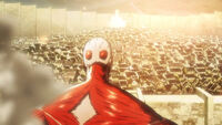 Colossal Titan looming over Shiganshina