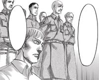 Erwin kneels at his audience with the king