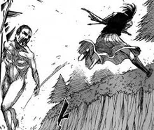 Sasha combatte contro il Gigante per difendere la bambina