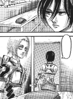 Mikasa glances back at her discarded scarf before leaving it behind