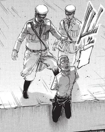 Gleis poussé hors du mur par Gross, afin de se faire dévorer par les Titans.