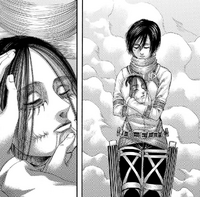 Mikasa emerges with Eren's decapitated head in her hands