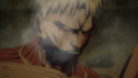 Reiner glares at Eren upon getting punched by him