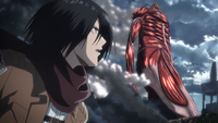 Mikasa observes the Colossal Titan