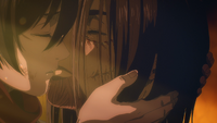 Eren is kissed by Mikasa