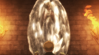 Annie in her crystal as Armin speaks to her