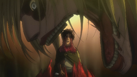 The Female Titan captures Eren