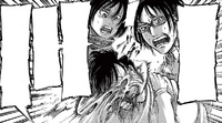 Hange and Mikasa pull Eren from his Titan