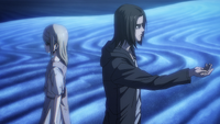 Ymir walks past Eren