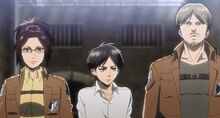 Hange and Mike escort Eren