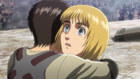 Eren surprises Armin with a hug