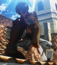 Injured Eren stands up