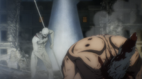 Eren is battered by the War Hammer Titan