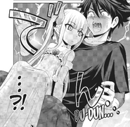 Shelia sits on Basara's lap