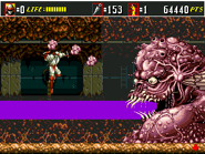 Joe Musashi jumping to avoid a laser spit by The Hydra