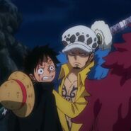 F4bf64c1-e2bd-44e2-ab98-c7925832d8e4.jpeg (43 KB) Luffy & Law during Raid on Onigashima.