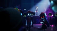 Uzi arrives to the prom during Doll's and V's fight