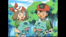 Ash and May with their Bulbasaur.