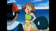 May poses in a bikini in front of Ash