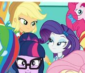 Applejack and Rarity holding hands and looking at eachother