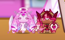 Eternal Sugar Cookie and Hollyberry Cookie displayed together as pop figurines in 🪽 Eternal Sugar Cookie REACTS to fanart! 💘💌