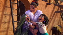 Madrigal Sisters hugging