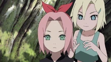 Ino gives Sakura a ribbon.