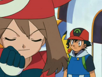 May is happy when Ash agrees to travel with her.