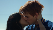 Veronica gives Archie a lucky kiss before the race