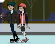 Tom and Jake happily ice-skating together 