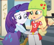 Rarity tweaking Applejack's clothes