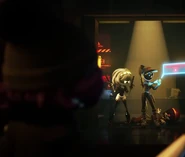 V staring at Doll with Uzi near