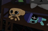 Shelly and Astro plushies next to each other in the gift shop map