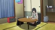 Ema eating in her home