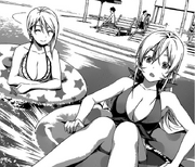 Alice and Erina poolside