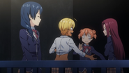 Megumi observing Ikumi telling Yuki & Ryoko of Soma recent shokugeki wins. (OVA 4)