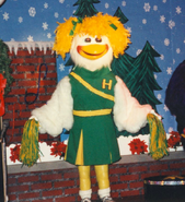 Latex 3-Stage Animatronic (1996-2000) with blonde hair and green cheerleader outfit (only used at Alabama 3-Stages, and Metairie, Louisiana)