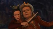 The Evil Queen threatens Queen Lillian