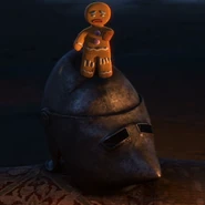 Gingy standing atop a knight’s helmet in Scared Shrekless