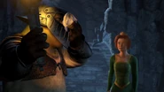 Shrek uses Fiona's favour as a rag to wipe his face