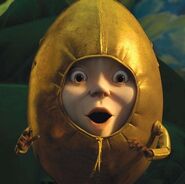 Humpty Dumpty in his golden egg suit.