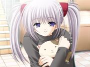 Primula smiling with her cat plushie, Rin gave her.