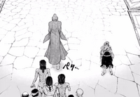Zerofuku watches the people follow Buddha with smiles, despite looking raggedy