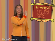 Rhinoceros. Use your pinky to show the rhino’s horn. Rhinoceros!