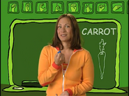 Carrot. Like you're holding a carrot, and you chomp it off.