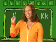 K. Put your two fingers up, and your thumb in between for a K.