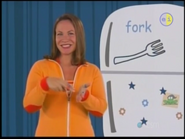 Fork! Your fingers are like a fork poking your food. Fork.