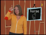 Horse. Make your two fingers flap like a horse's ear. It's also an H for horse. Horse.