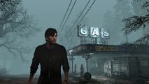 Murphy standing in front of a nearby gas station on the way to Silent Hill.