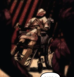The Wheelman appears to Anne during the prison riot.